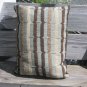 pale blue, beige and brown pillow