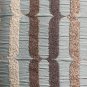 pale blue, beige and brown pillow