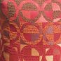 Red and mustard circle pillow