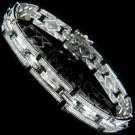 14k Gold Diamond Bracelet with Baguette and Round Cut Diamonds