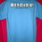 Funny ~ How do you keep an idiot busy? (See back of shirt) Size MEDIUM  T-Shirt