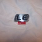 Toyota Corolla trunk emblem "LE"