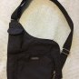 Baggallini crossbody nylon Black lie flat profile Travel shoulder bag tan lining