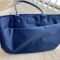 Lipault Paris Plume Shopper Tote shoulder bag • Trolley sleeve Outside pockets  nylon leather