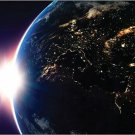 Incredible Space Photography showing an Earth Sunrise Over the West Poster 20x30