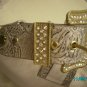 Charm and Luck pebbled leather designer handbag.