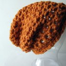 the slacker beanie hat in pumpkin orange.