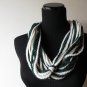 the big knot scarf in cream and green.