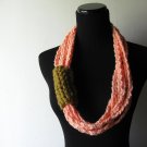 neck loops in peach and snapdragon.