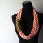 neck loops in peach and snapdragon.