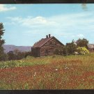 ABANDONED MOUNTAIN TOP HOME IN A SUMMER FIELD OF WILDFLOWERS 836