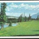 14th Fairway Jasper Park Lodge Golf Course Lac Beauvert Man in Canoe 1003 14th Fairway Jasper Park Lodge Golf Course Lac Beauvert Man in Canoe 1003