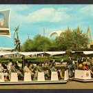 1964 New York Worlds Fair Glide a Ride Trains Rocket Thrower In Background Chrome Postcard 691