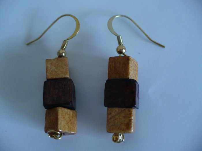 Earrings made with cube shaped wooden beads