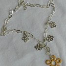 Golden flowers silver necklace
