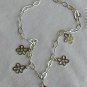 Golden flowers silver necklace