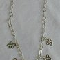 Golden flowers silver necklace