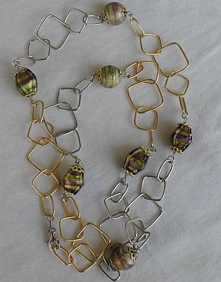 Golden and silver rings necklace