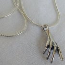 Finger pendant