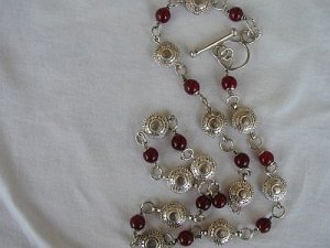 Red and silver coins necklace