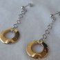 Dangling golden rings earrings