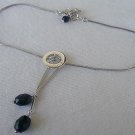 silver and black zircon