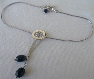 silver and black zircon