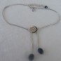 silver and black zircon