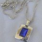 Mini blue cat eye pendant