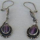 Dangling purple earrings