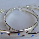 Reddish and blue hoops