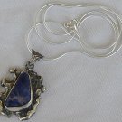 Raw lapis pendant
