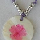 Purple flower on mother of pearl