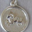 Capricon round pendant