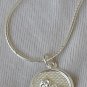 Capricon round pendant