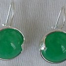 Shiny green round earrings