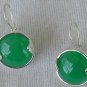 Shiny green round earrings