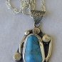 Turquoise pressed pendant