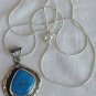 Turquoise pressed stone pendant
