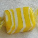Yellow candy miniature
