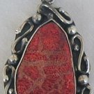 Colored sea stone pendant