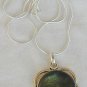 Greenish glass pendant