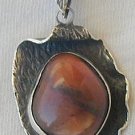 Reddish silver pendant Reddish silver pendant