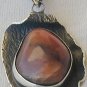 Reddish silver pendant