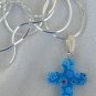 Little blue morano Cross with flowers