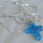 Little blue morano Cross with flowers