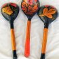 3  decorative wood spoons