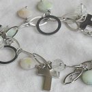 Quartz and silver crosses bracelet