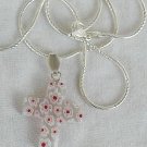 White with red flower morano Cross