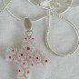 White with red flower morano Cross